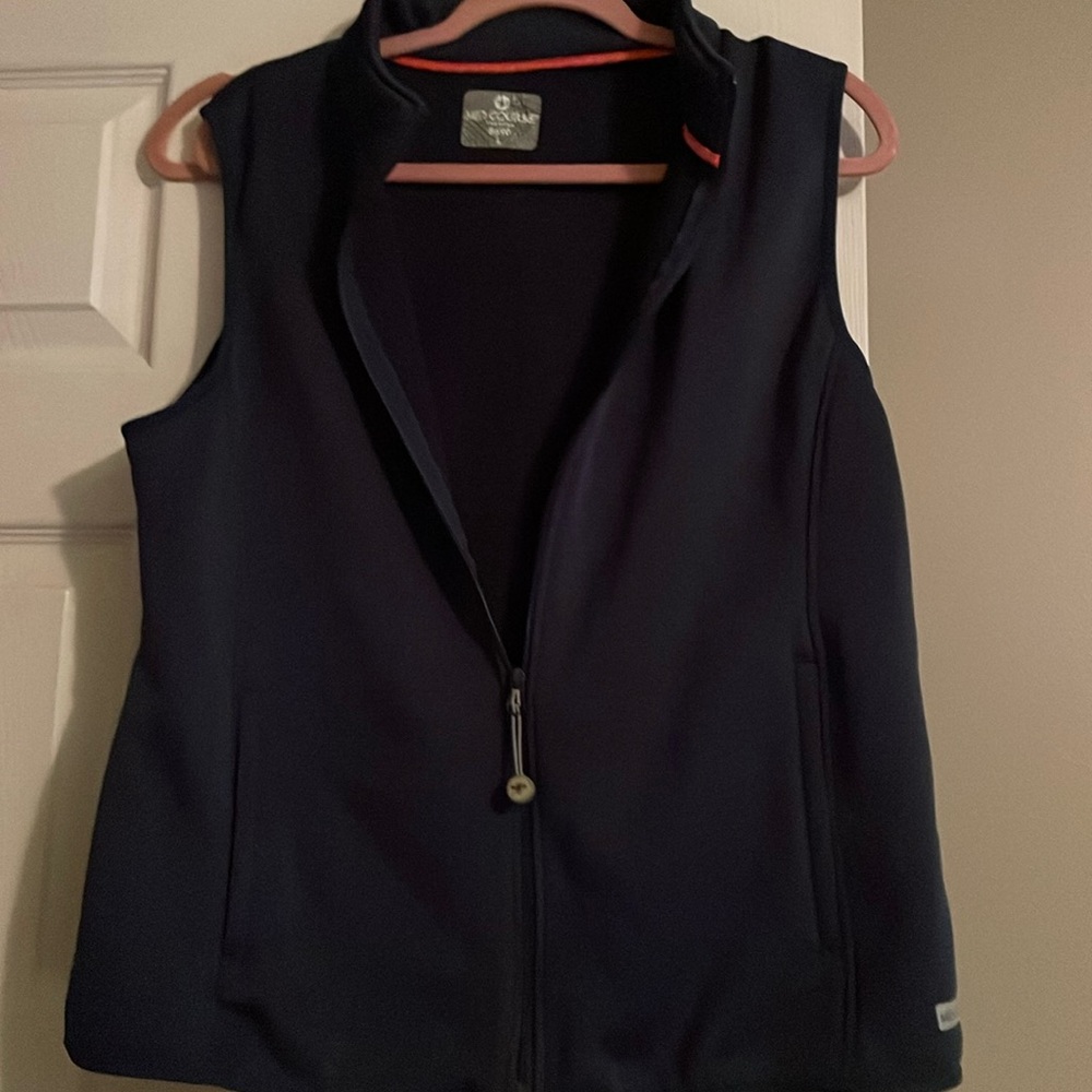 Scrub vest.